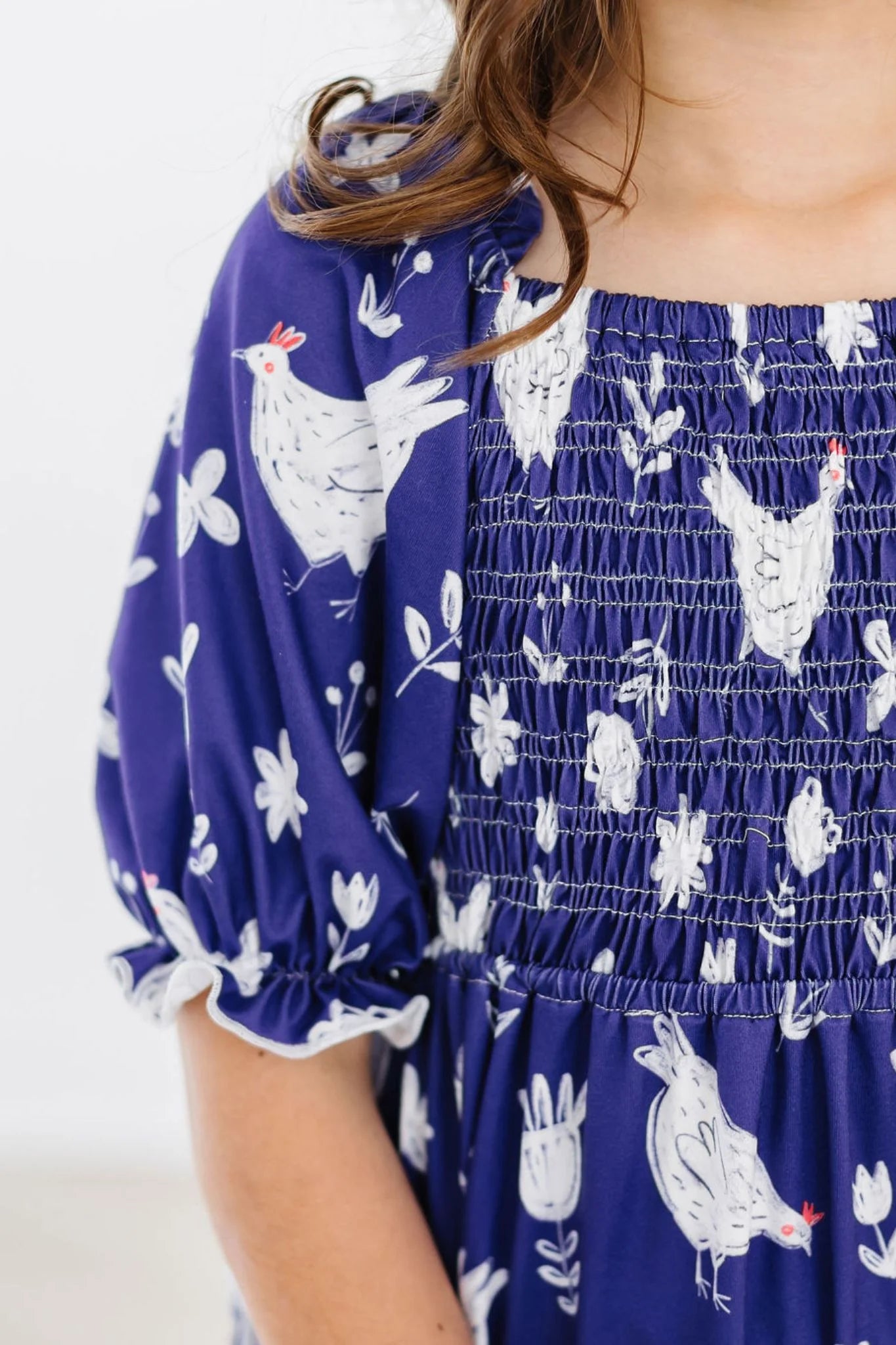 Feathered Smocked Ruffle Dress