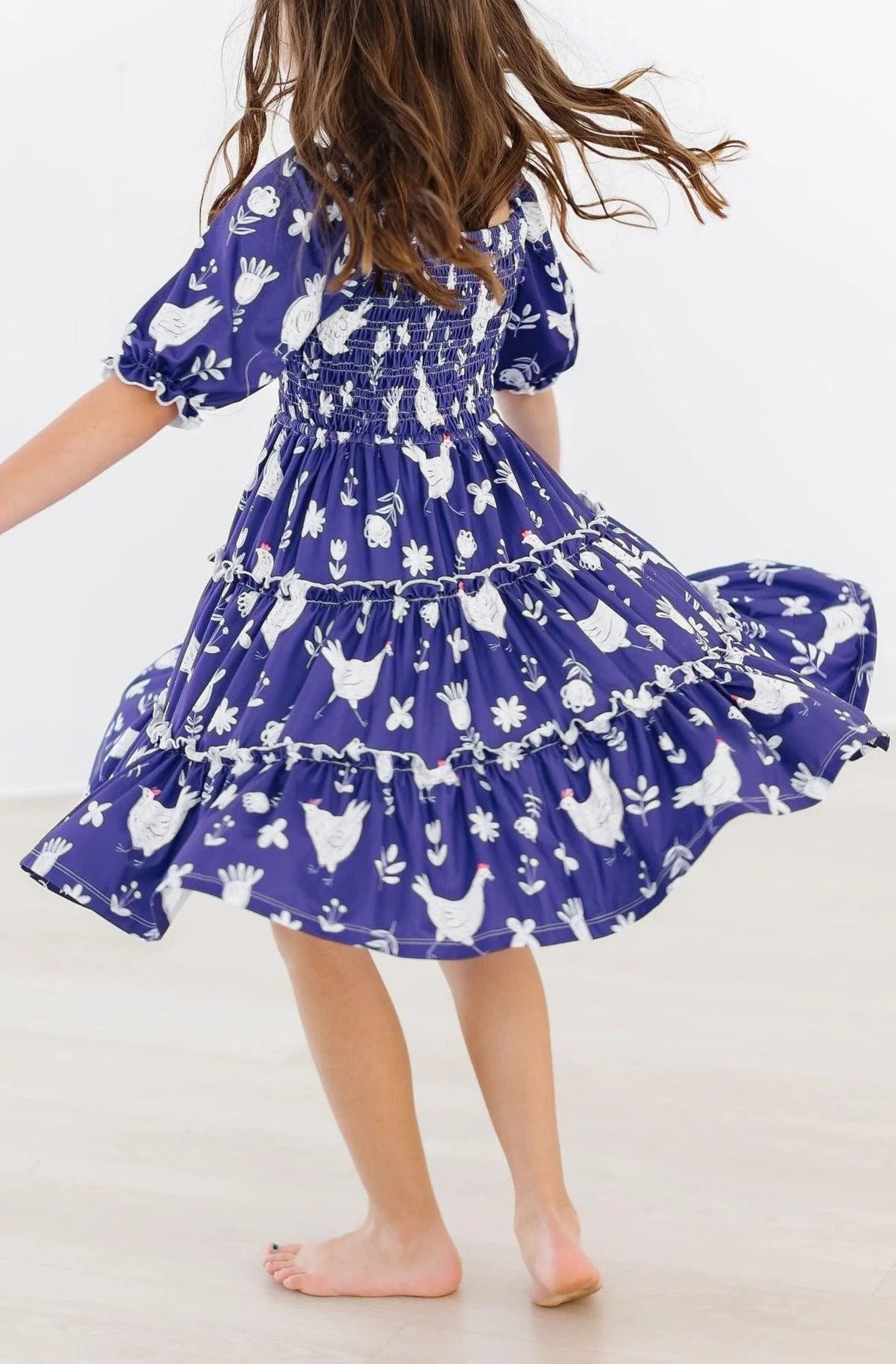 Feathered Smocked Ruffle Dress