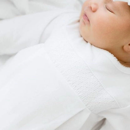 Smocked White Footie with White Trim